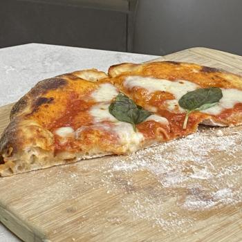 Bready Mercury Sourdough pizza first slice