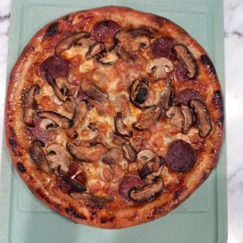 V9 Pizza first slice